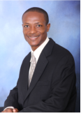 H.E. Rev. Dr. Carl Christian, CDKA, CDSE, Ph.D.