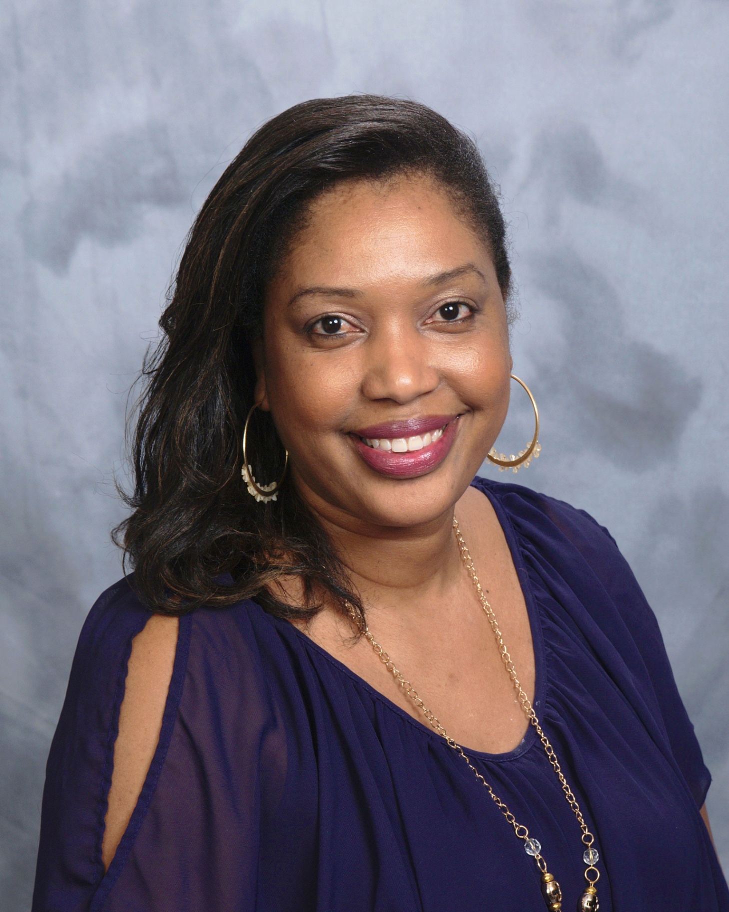 H.E. Rev. Dr. Sharon J. Baquedo-Phinn, OEA, O.P.C., Ph.D.