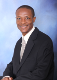 H.E. Rev. Dr. Carl Christian, CDKA, CDSE, Ph.D.