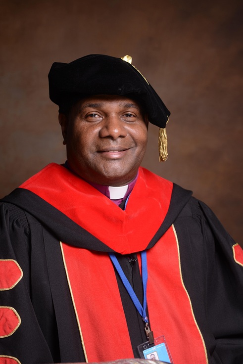 Dr. Phillip S. Phinn in academic regalia